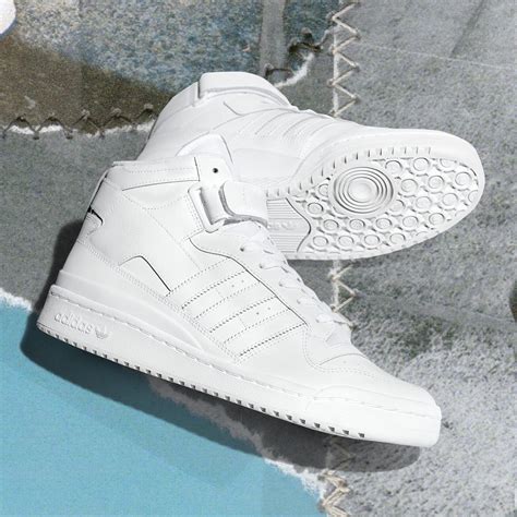 adidas Originals Forum mid trainers in triple white 